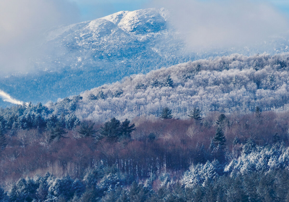 Mist shrouds Mount Mansfield